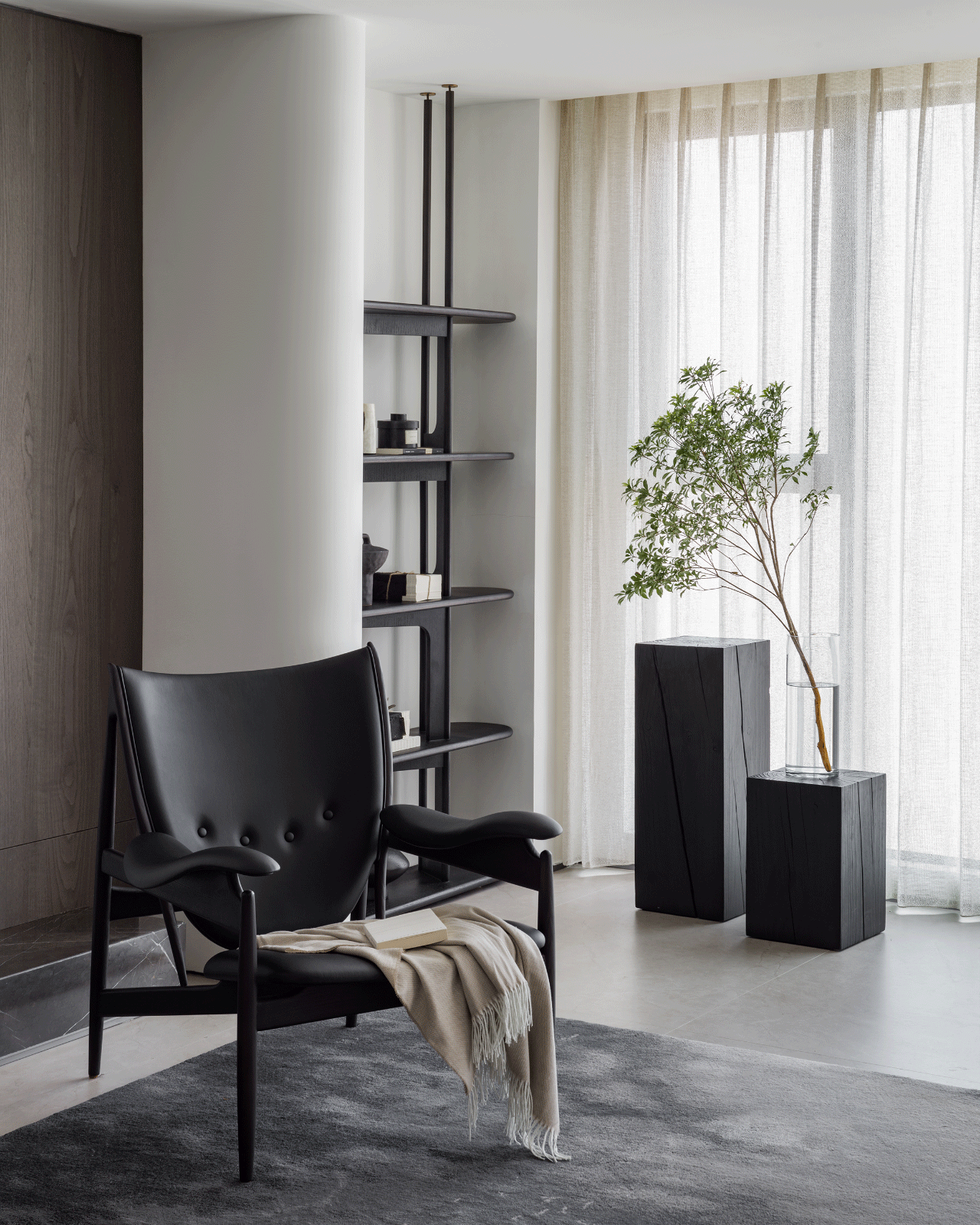 Comfort and Style: The Appeal of the Black Leather Armchair