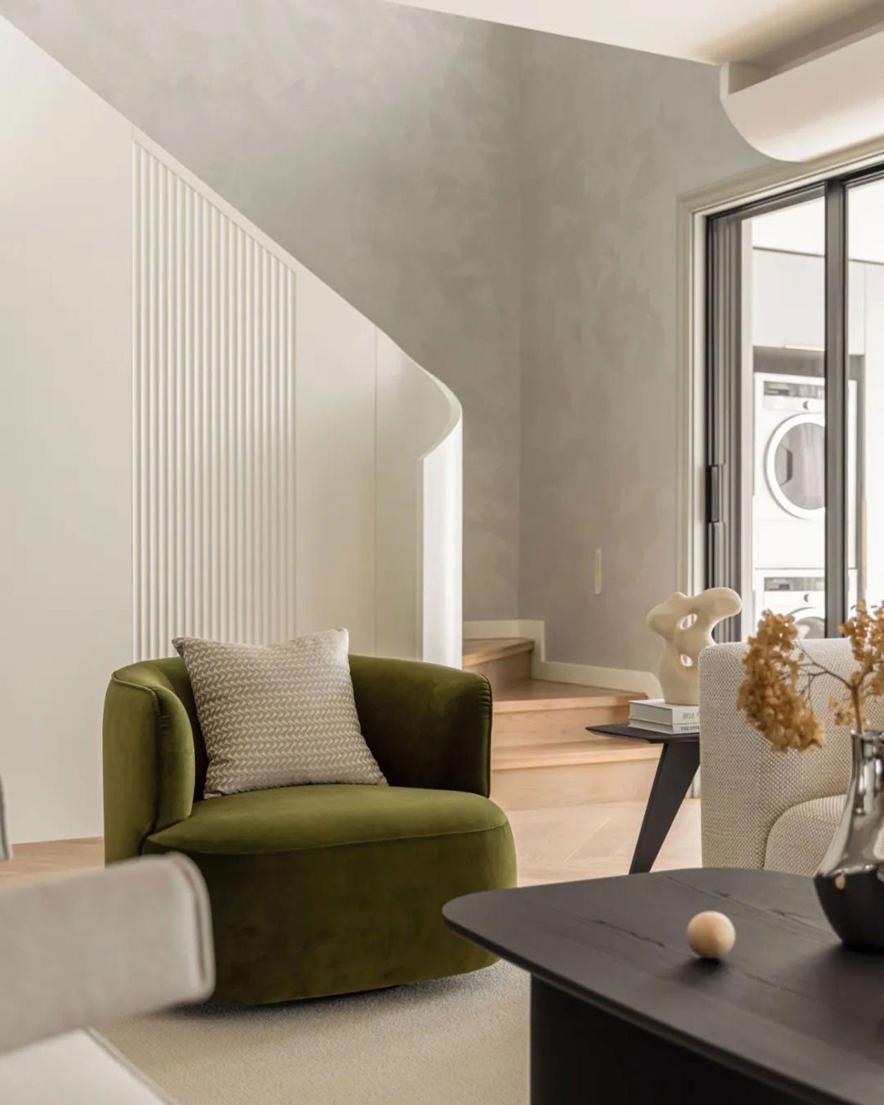 Elevate Your Living Room with a Striking Green Velvet Armchair