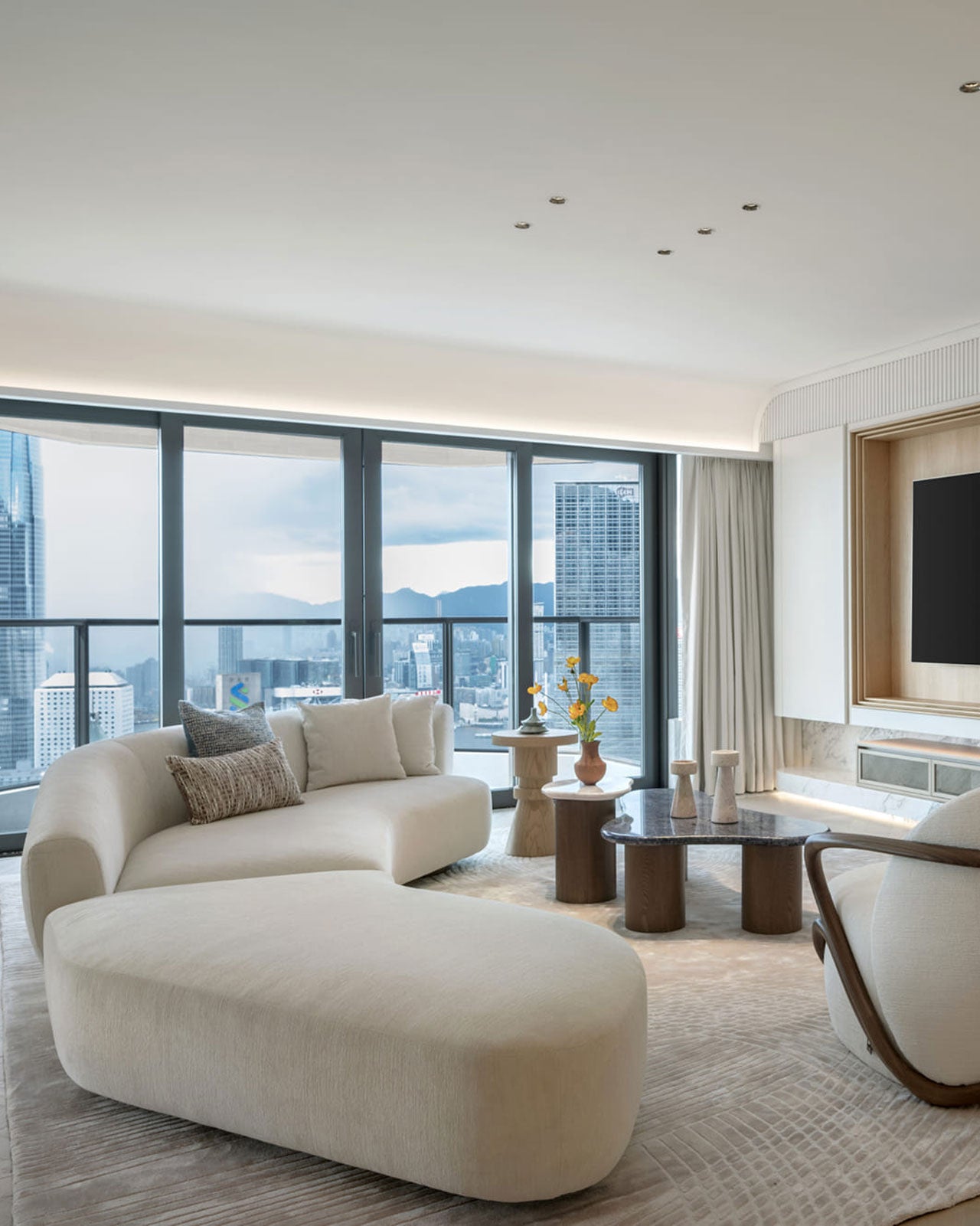 Sophisticated Comfort: The White Curved Fabric Sofa Experience