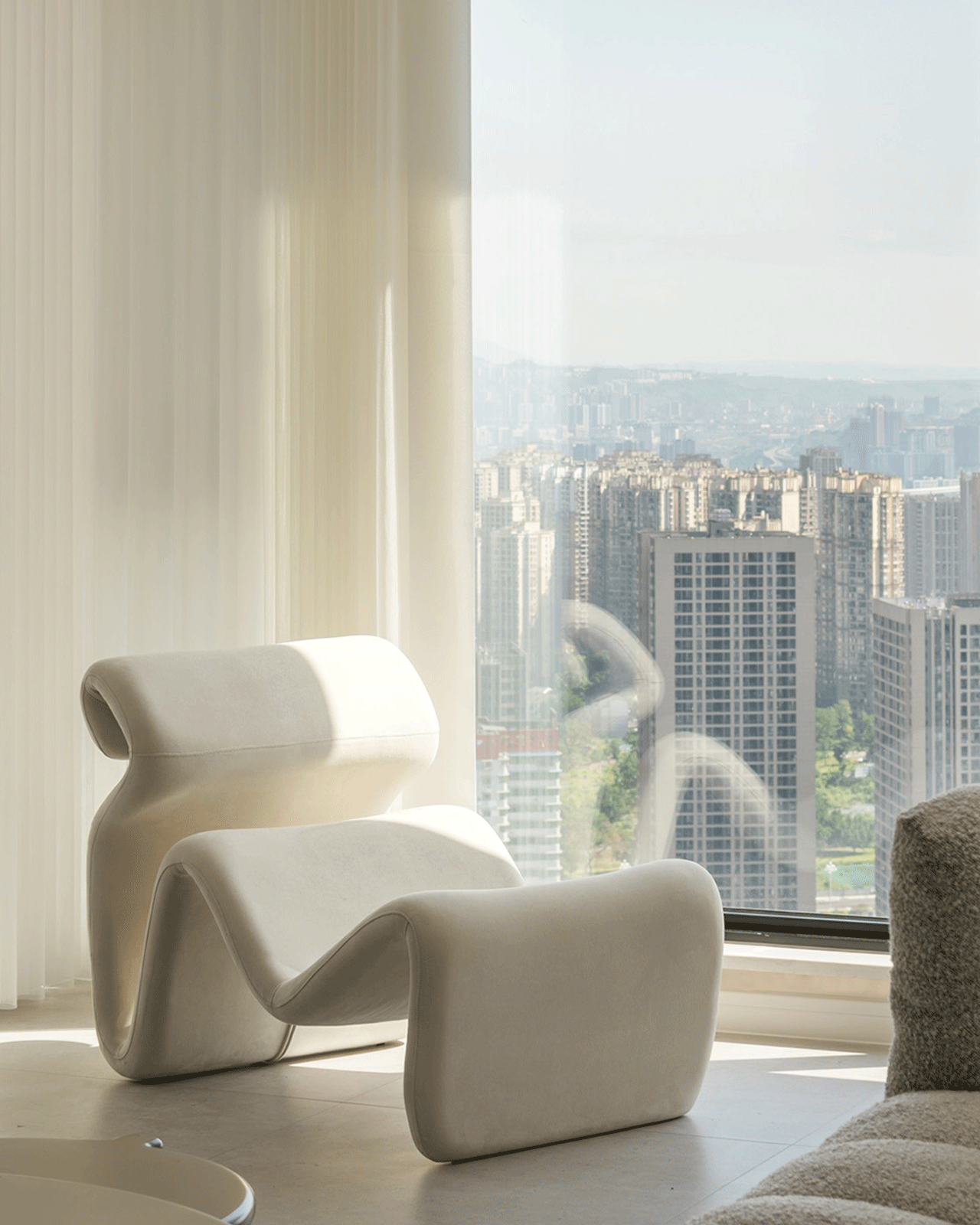 Elegance in Cream: White Irregular Folding Recliner